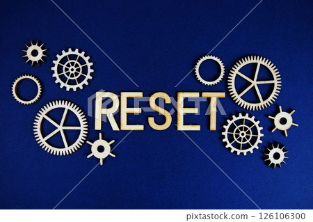 Reset alphabet letters with gears element on navy blue background Reset alphabet letters with gears element on navy blue background 126106300