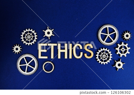 Ethics alphabet letters with gears element on navy blue background Ethics alphabet letters with gears element on navy blue background 126106302