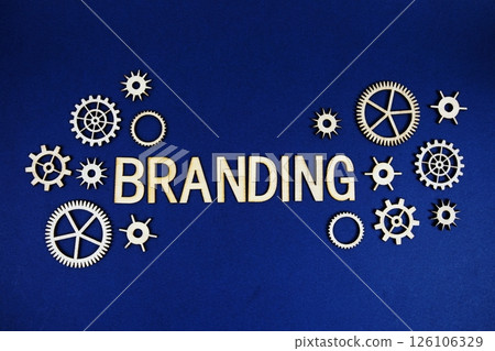 Branding alphabet letters with gears element on navy blue background 126106329