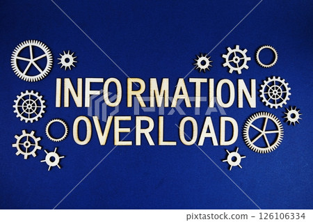 Information Overload alphabet letters with gears element on navy blue background Information Overload alphabet letters with gears element on navy blue background 126106334