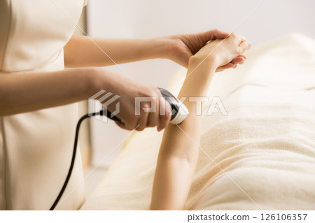 Arm hair removal treatment scene 126106357