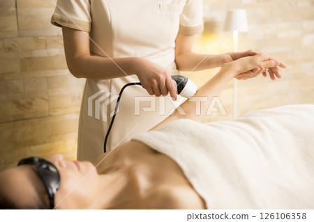 Arm hair removal treatment scene 126106358