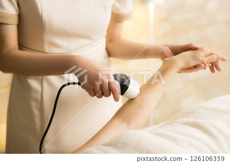 Arm hair removal treatment scene Arm hair removal treatment scene 126106359