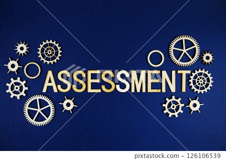 Assessment alphabet letters with gears element on navy blue background 126106539