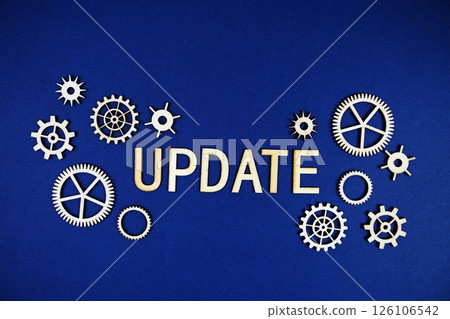 Update alphabet letters with gears element on navy blue background 126106542