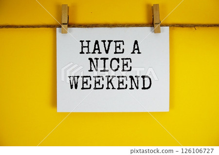 Have A Nice Weekend text on paper card on yellow background Have A Nice Weekend text on paper card on yellow background 126106727