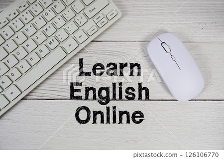 Learn English Online text with keyboard and optical mouse on wooden background 126106770