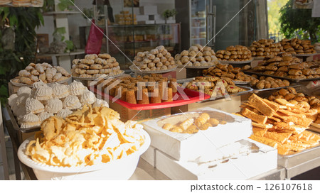 different type of traditional biscuits and uzbek baked items is on sale in chorsu bazaar at Uzbekistan 126107618