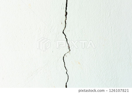 Crack or damage on concrete wall need repair. 126107821