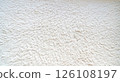 Fluffy white rug texture background 126108197