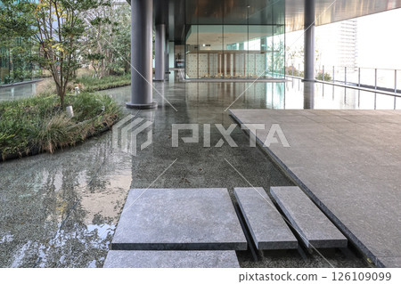 March 24 2025 Building Atrium with Water Features and Greenery, Japan 126109099