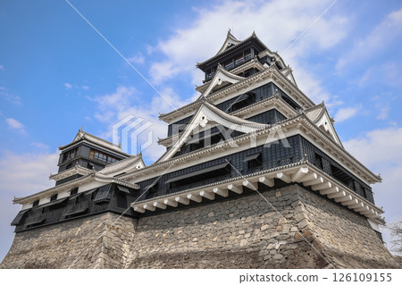 March 24 2025 Traditional Japanese Castle Tower Against a Clear Blue Sky, Japan 126109155