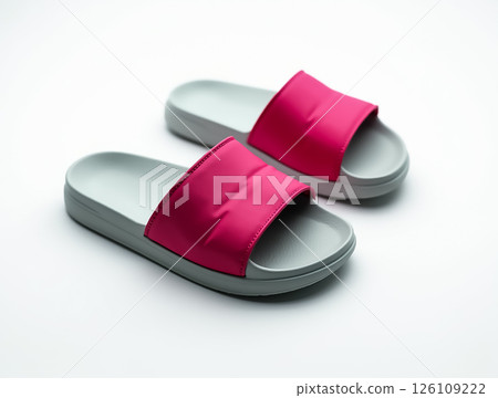 Stylish pink slides made for comfort and versatility ideal for casual indoor and outdoor wear Stylish pink slides made for comfort and versatility ideal for casual indoor and outdoor wear 126109222