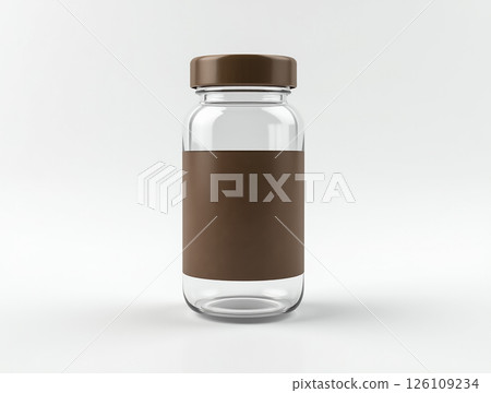 Clear glass container with a brown lid and label design showcased against a plain background Clear glass container with a brown lid and label design showcased against a plain background 126109234