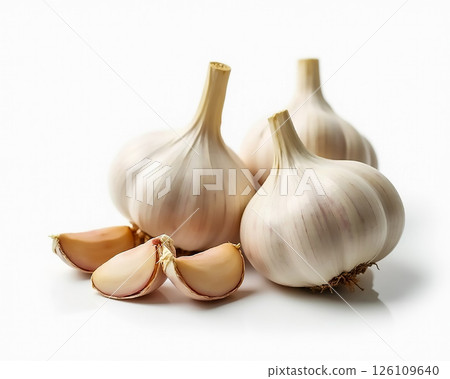 Fresh garlic bulbs and cloves on a white background showcasing their natural texture and color Fresh garlic bulbs and cloves on a white background showcasing their natural texture and color 126109640