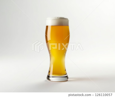 Golden lager served in a tall glass with a frothy head against a plain background Golden lager served in a tall glass with a frothy head against a plain background 126110057