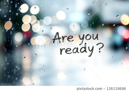 Text Are you ready on wet glass surface with raindrops Text Are you ready on wet glass surface with raindrops 126110686