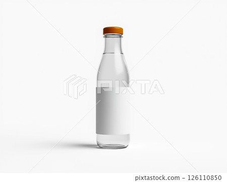 Clear glass bottle with a blank label and orange cap standing upright on a plain background Clear glass bottle with a blank label and orange cap standing upright on a plain background 126110850