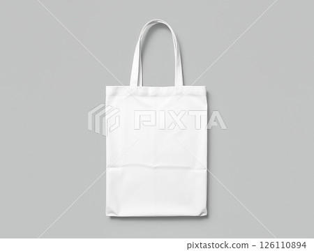 Attractive white tote bag showcasing simplicity and functionality for everyday use at shopping or casual outings Attractive white tote bag showcasing simplicity and functionality for everyday use at shopping or casual outings 126110894