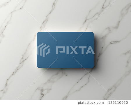 Blue rectangular object on a marble countertop in a well-lit room during the day Blue rectangular object on a marble countertop in a well-lit room during the day 126110950