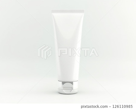 Elegant white cosmetic tube with a silver cap displayed on a neutral background in a minimalist setting 126110985