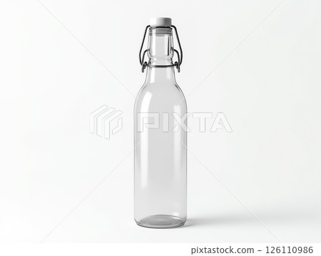 Clear glass bottle with metal closure displayed against a simple white background 126110986