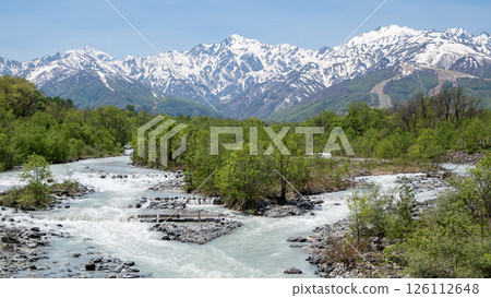 Snow-covered Northern Alps and clear streams, Hakuba Village, Nagano Prefecture 126112648