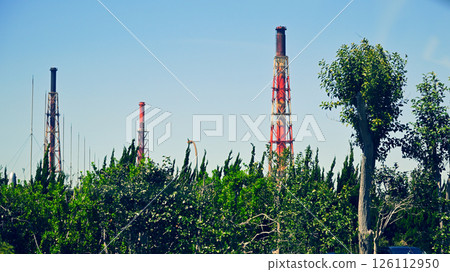 Clear sky and factory chimneys Clear sky and factory chimneys 126112950