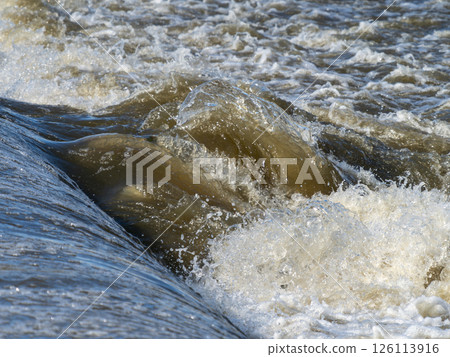 The muddy Yamato River after a heavy rain 126113916