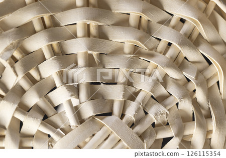 basket for food or other items, natural branches painted white from which a decorative basket is woven closeup basket for food or other items, natural branches painted white from which a decorative basket is woven closeup 126115354