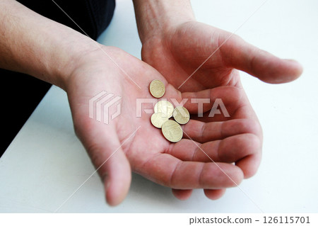 Thick wad of money cash on table Thick wad of money cash on table 126115701