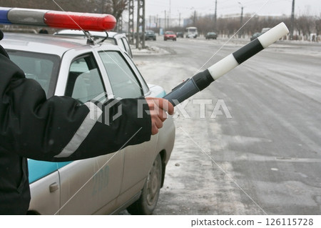 Police man is directing traffic Police man is directing traffic 126115728