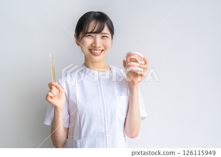 Image of a dental hygienist Image of a dental hygienist 126115949