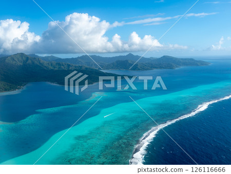 Aerial view of Tahaa island, French Polynesia, with turquoise lagoon and reef 126116666