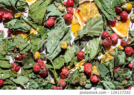 Dried Herbal Tea Mix Ingredient Close Up. Blend of Leaves, Berry and Fruit Pieces for Healthy and Calming Detox Drink Beverage. 126117282