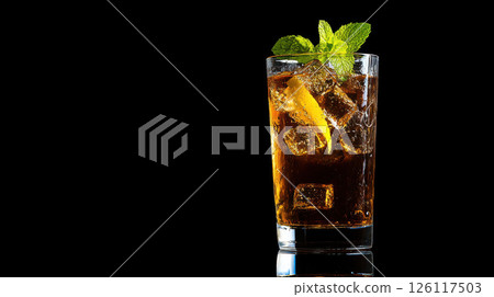 Photo of a long island iced tea with lemon and mint, on a high-resolution, high-quality black isolated background 126117503