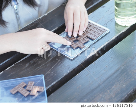 child playing with puzzles 126117516