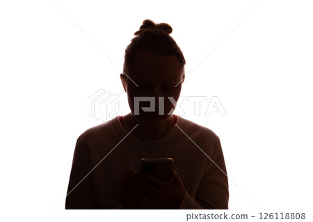 Silhouette young woman with hair up using smartphone, white background 126118808