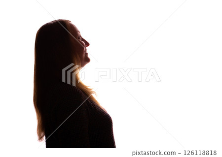 Silhouette of young woman looking up thoughtfully on white background 126118818