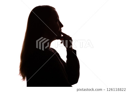 Silhouette of young woman touching her chin thoughtfully, white background 126118822