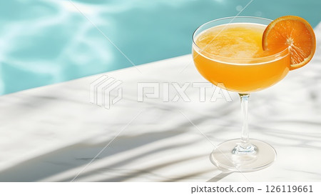 Horizontal banner with fresh orange cocktail on the side of the pool, summer hotel vacation Horizontal banner with fresh orange cocktail on the side of the pool, summer hotel vacation 126119661
