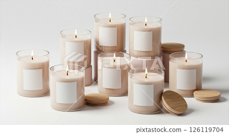 Elegant Collection of Luxury Scented Candles in Glass Jars with Blank Labels on Minimalist White Background 126119704