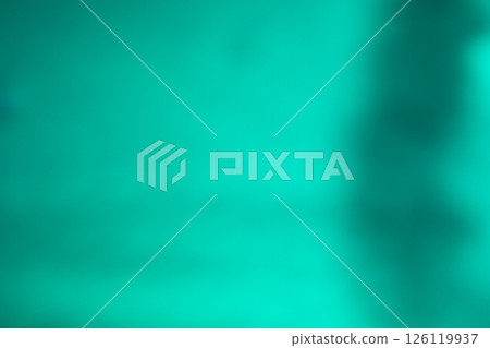 Green color image of swaying shadows on water (stock photo) 126119937