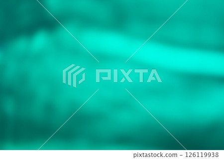 Green color image of swaying shadows on water (stock photo) 126119938