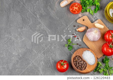 Cooking background tomatoes, herbs and spices. Vegetarian food, health or cooking concept. top view. copy space 126120483