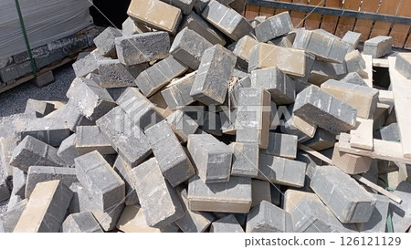 Stacks of concrete blocks on a construction site, top view Stacks of concrete blocks on a construction site, top view 126121129