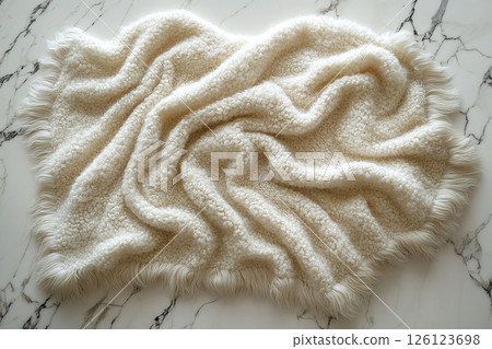 Alpaca wool throw blanket on a white background. For minimalist luxury living room. 126123698