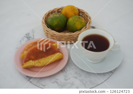 two pieces of traditional Indonesian sponge cake known as kue pukis 126124723