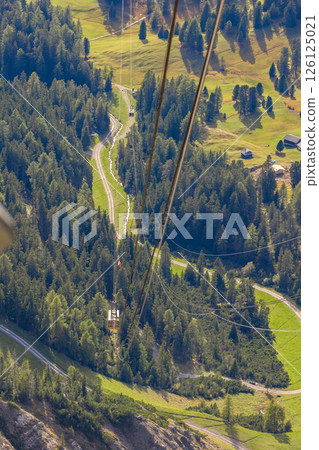 Cable car to Seceda in Dolomites Alps, Italy 126125021