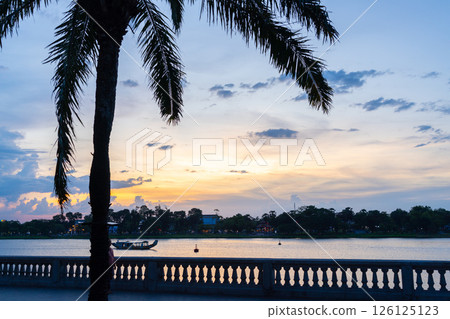 Sunset of Song Huong Perfume River in Hue, Vietnam Sunset of Song Huong Perfume River in Hue, Vietnam 126125123